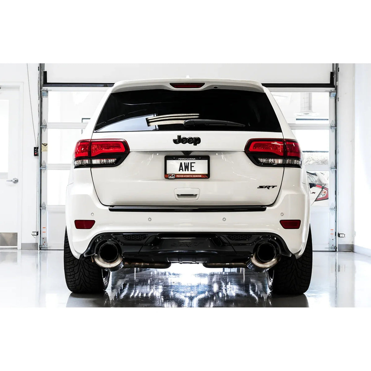 AWE Tuning 2014-2021 Jeep Grand Cherokee SRT Track Edition Exhaust - Diamond Black Tips - The Coin Has A Say