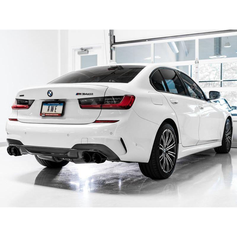 AWE Tuning 2019+ BMW M340i (G20) Resonated Touring Edition Exhaust - Quad Diamond Black Tips - The Coin Has A Say