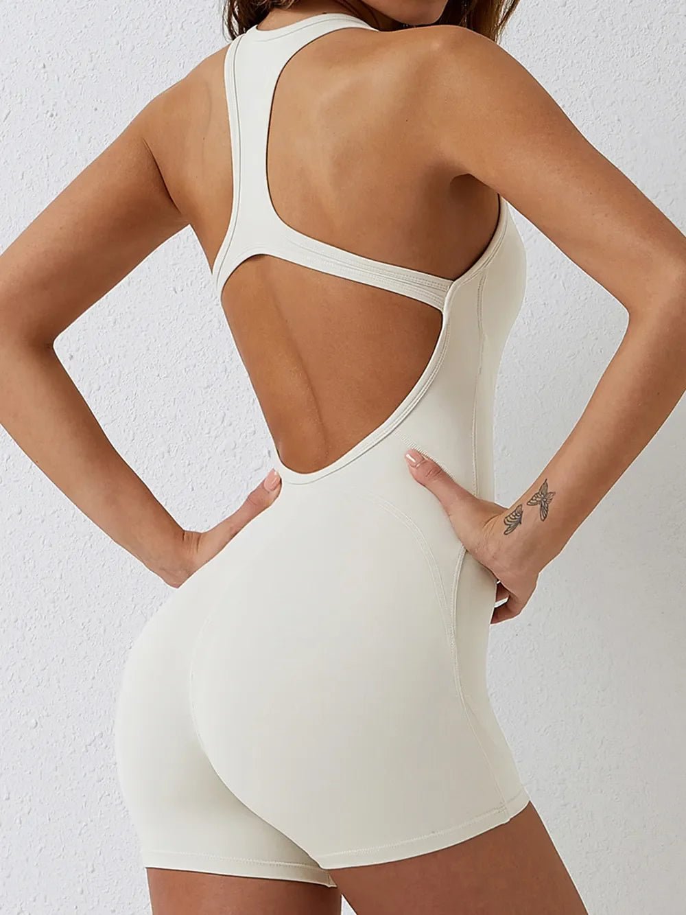 Basic Bae Cutout Racerback Sleeveless Active Romper - The Coin Has A Say