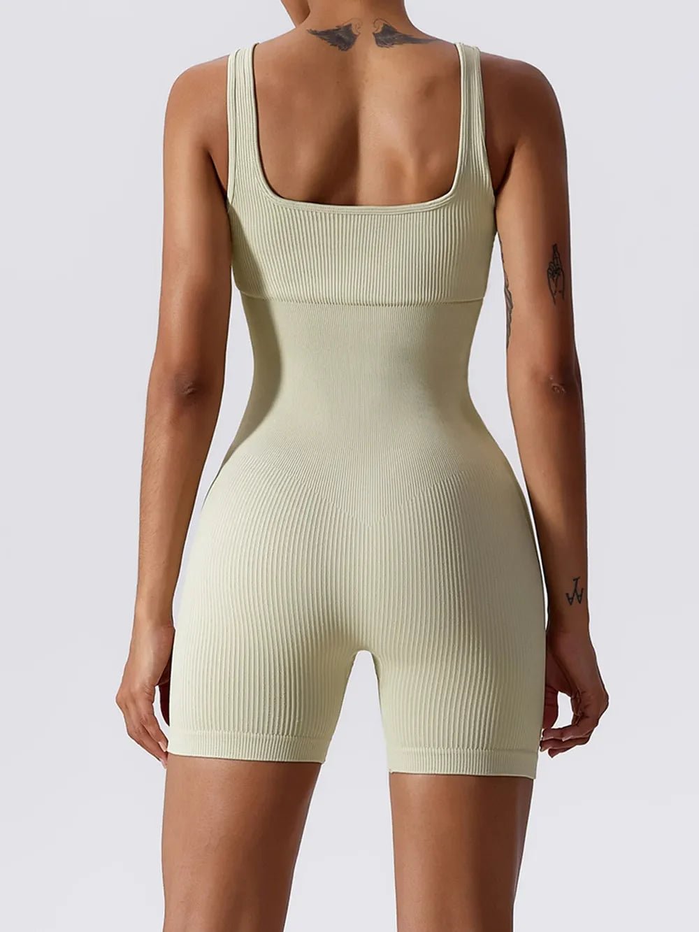 Basic Bae Ribbed Sleeveless Active Romper - The Coin Has A Say