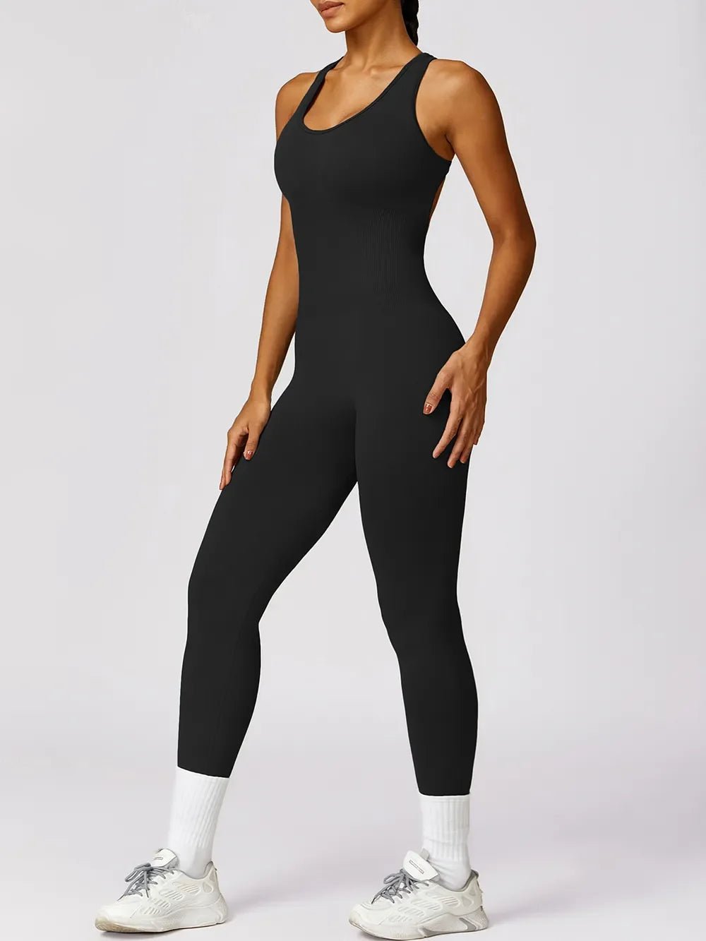 Basic Bae Sleeveless Cutout Racerback Active Jumpsuit - The Coin Has A Say